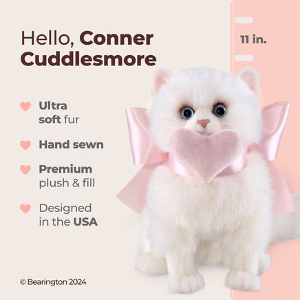 White fluffy cat-shaped toy with a pink bow, labeled 'Hello, Conner Cuddlesmore', on a light pink background.