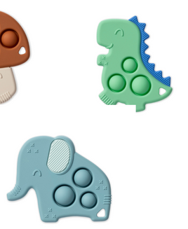 Three silicone toys shaped like a mushroom, dinosaur, and elephant on a white background