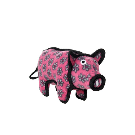 Pink pig-shaped dog toy with black accents on a white background