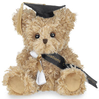 Graduation-themed teddy bear with a cap and diploma on a white background