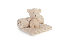 Beige teddy bear and blanket set on a white background