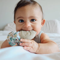 Itzy Mitt™ Silicone Teething Mitt - Baby Teether