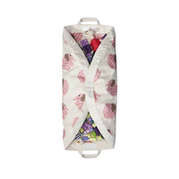 Foldable toy storage bag with pink  elephant pattern on a white background