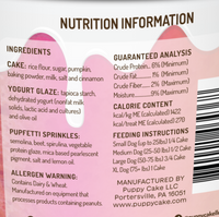 Dog cake in a cup packaging with nutrition information and ingredients listed.