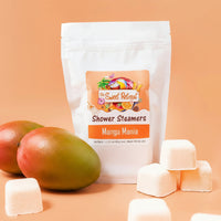 Mango-themed shower steamers with packaging on an orange background