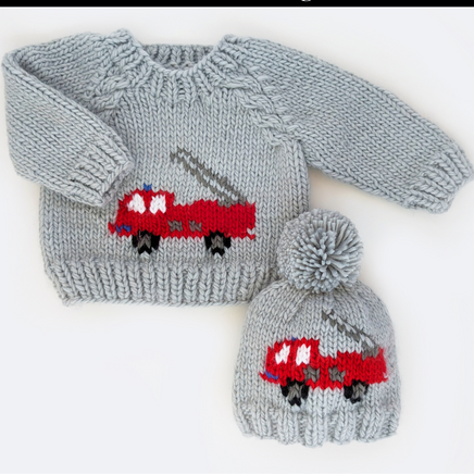 Gray sweater and matching hat with fire truck design on a white background