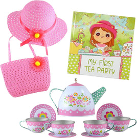 Children's tea party set with pink hat, bag, teapot, cups, and saucers, featuring a book titled 'My First Tea Party'.