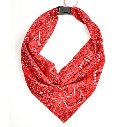 A red and white checkered pet bandana with a buckle clip attachment laid out flat.