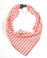 Red and white checkered bandana with a black clip on a white background