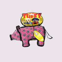 Pink and black pig-shaped dog toy with Tuffy branding on a white background