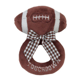 Plush football-shaped toy with a bow and 'Touchdown' text on a white background