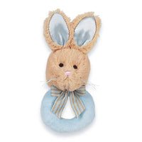 Plush bunny toy with a blue ring and bow tie on a white background