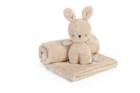 Beige plush toy with blanket on a white background