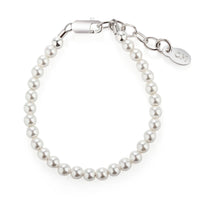Pearl bracelet with silver clasp on a white background
