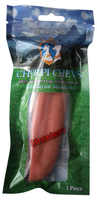 Package of Chirrip Chevs strawberry-flavored dog treat with a blue sky and green grass background.