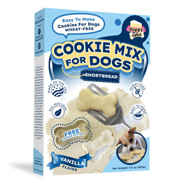 Box of Puppy Cake cookie mix for dogs with vanilla flavor on a white background