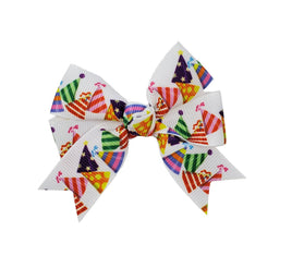Colorful dog bow with party hat-themed design on a white background