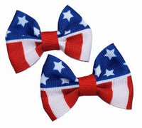 Two American flag-themed Dog bow clips on a white background