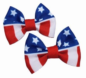 Two American flag-themed Dog bow clips on a white background