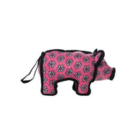 Pink pig-shaped dog toy with black floral pattern on a white background
