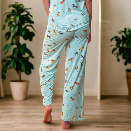 Light blue pajama set with animal pattern on a beige background