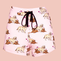womens pajama shorts in a cute puppy love dog print pink background