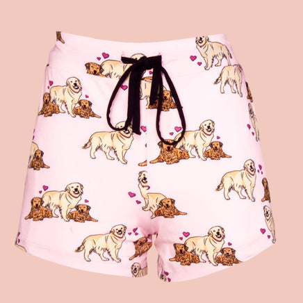 womens pajama shorts in a cute puppy love dog print pink background