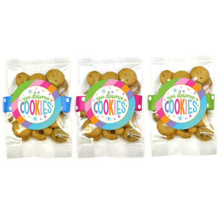 Three packages of cookies with colorful 'You Deserve Cookies' labels on a white background.