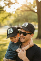 Black cap with 'Best Dad Ever' patch on a white background