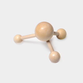 a small wooden back massager